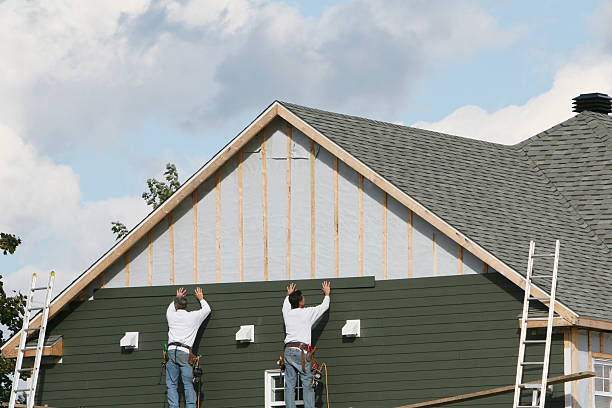 Professional Siding Contractor technician working in Tall Timbers, MD